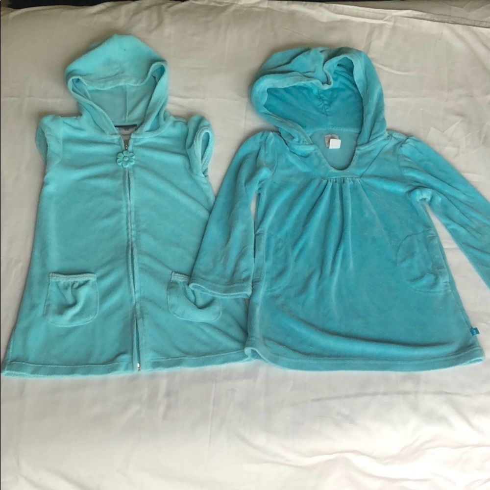 Set of 2 hooded swim coverups .